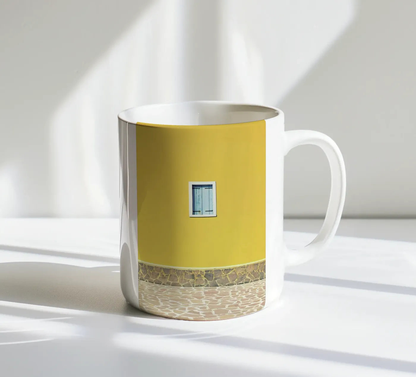 Yellow ceramic mug by Rupert Höller