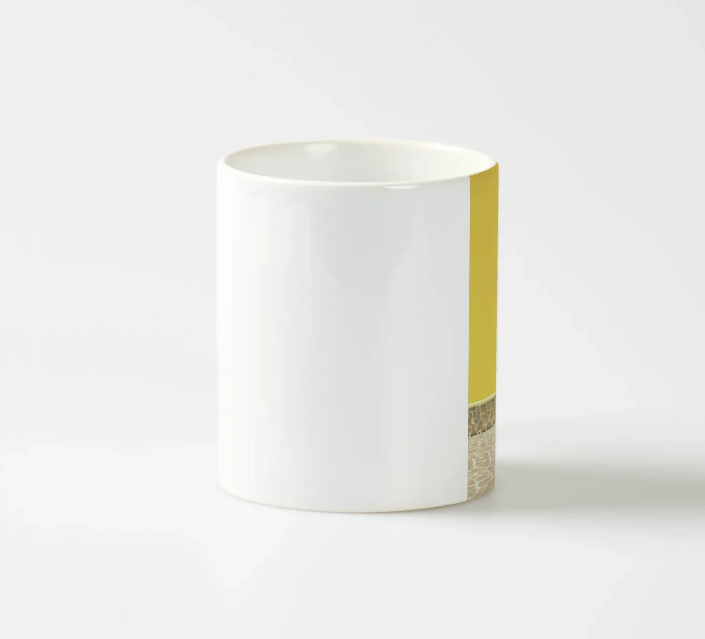 Yellow ceramic mug by Rupert Höller