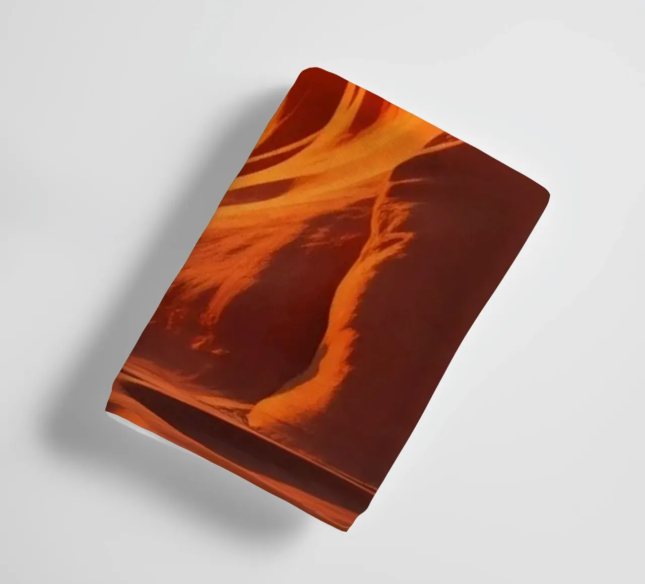 Sunset illuminates the curves of the sandstone formations towel by DesignDoodle