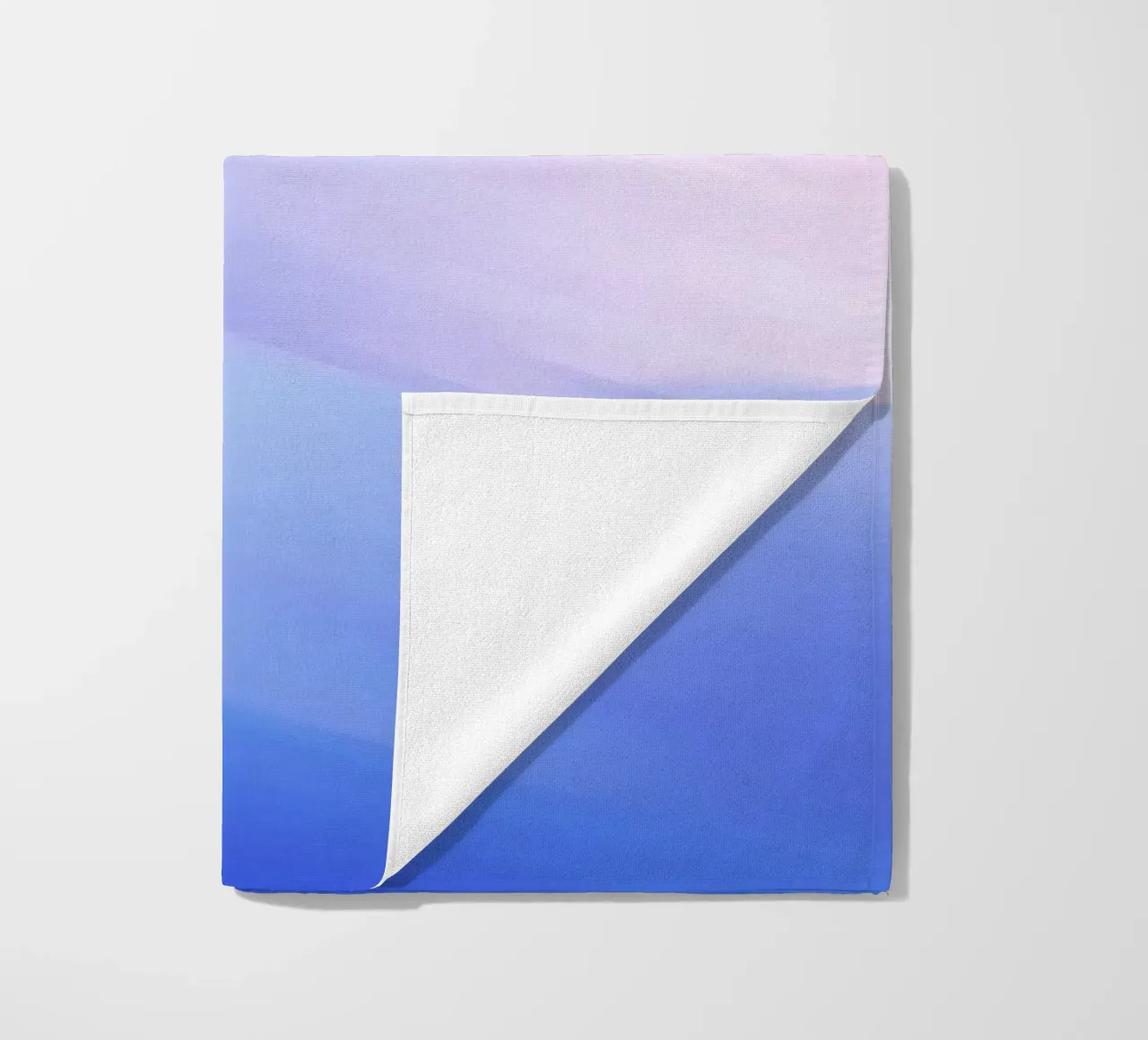 Abstract swirl of blue and pink colors creating a dreamy art beach towel by DesignDoodle