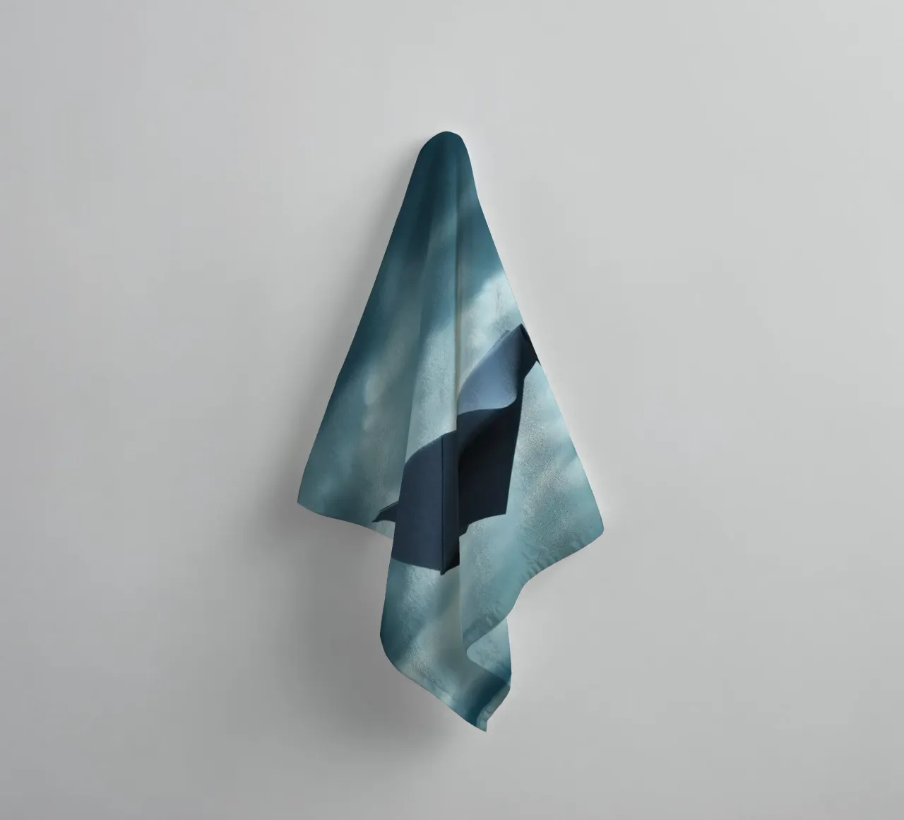 Floating origami crane against a dramatic cloudy sky towel by DesignDoodle