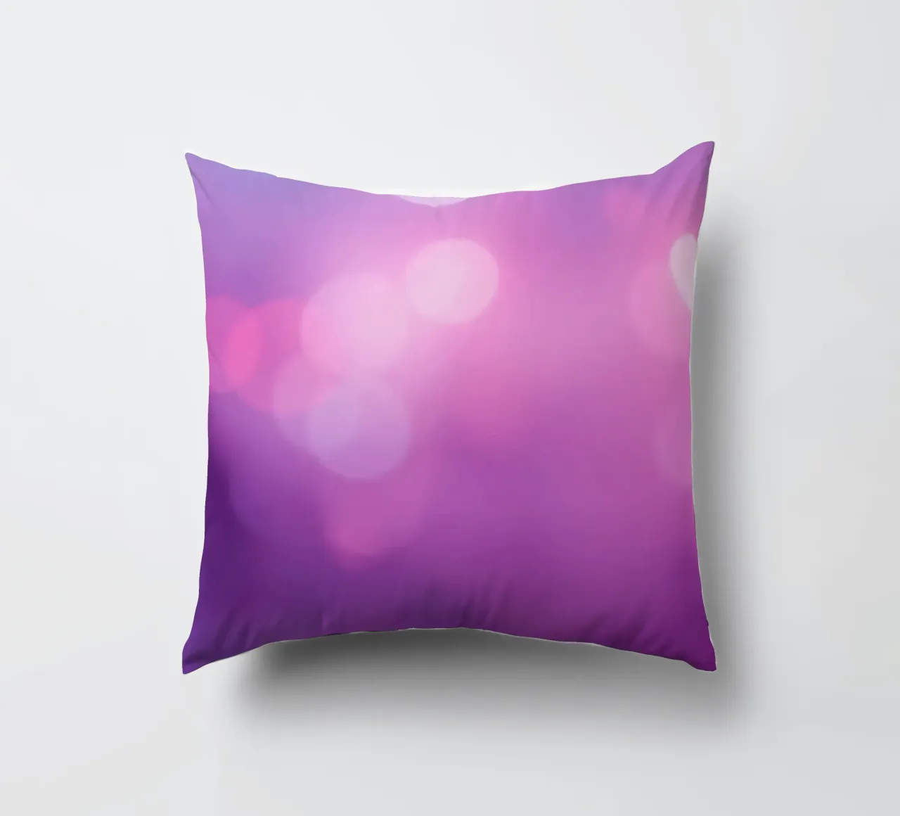 Gli effetti bokeh colorati creano un'atmosfera da sogno ad un livello di cuscino da DesignDoodle