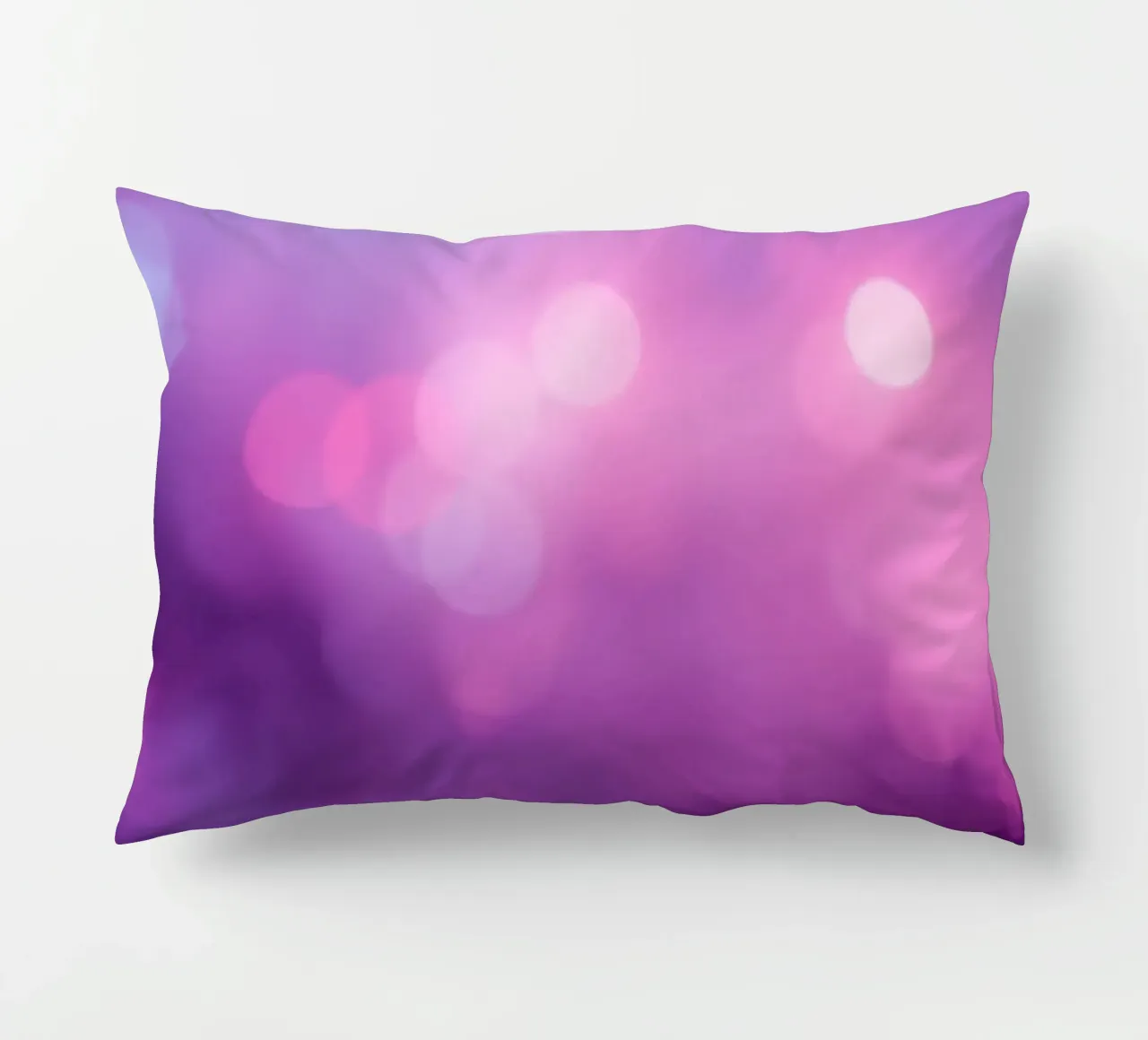 Gli effetti bokeh colorati creano un'atmosfera da sogno ad un livello di cuscino da DesignDoodle