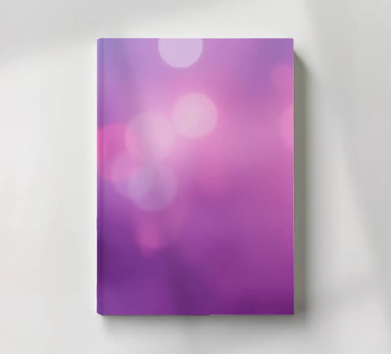Colorful bokeh effects create a dreamy atmosphere at an even notebook by DesignDoodle