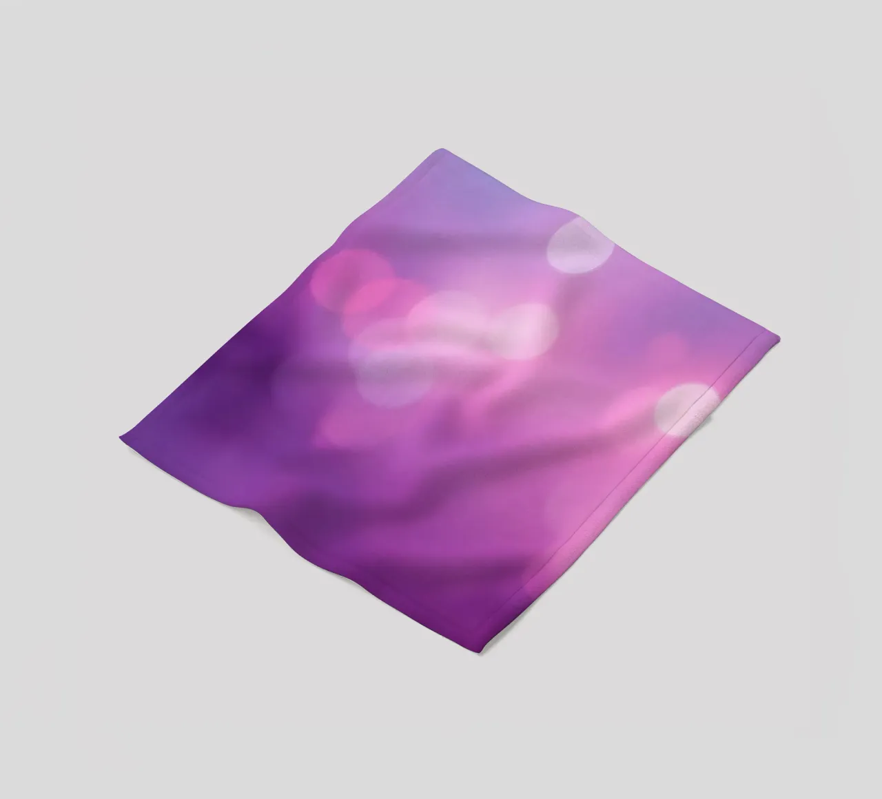 Gli effetti bokeh colorati creano un'atmosfera da sogno ad un livello di coperta in pile da DesignDoodle