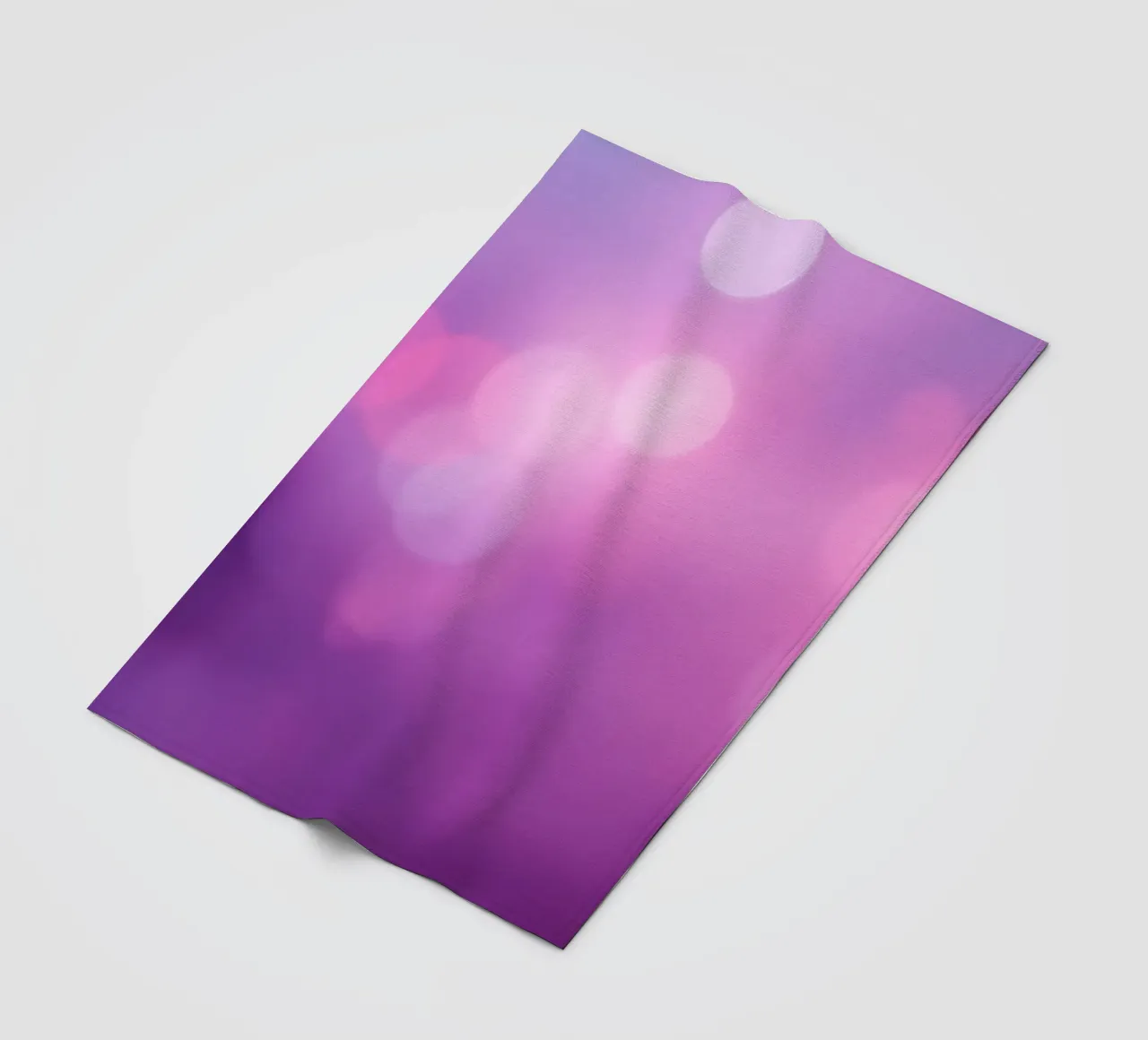 Gli effetti bokeh colorati creano un'atmosfera da sogno ad un livello di coperta in pile da DesignDoodle