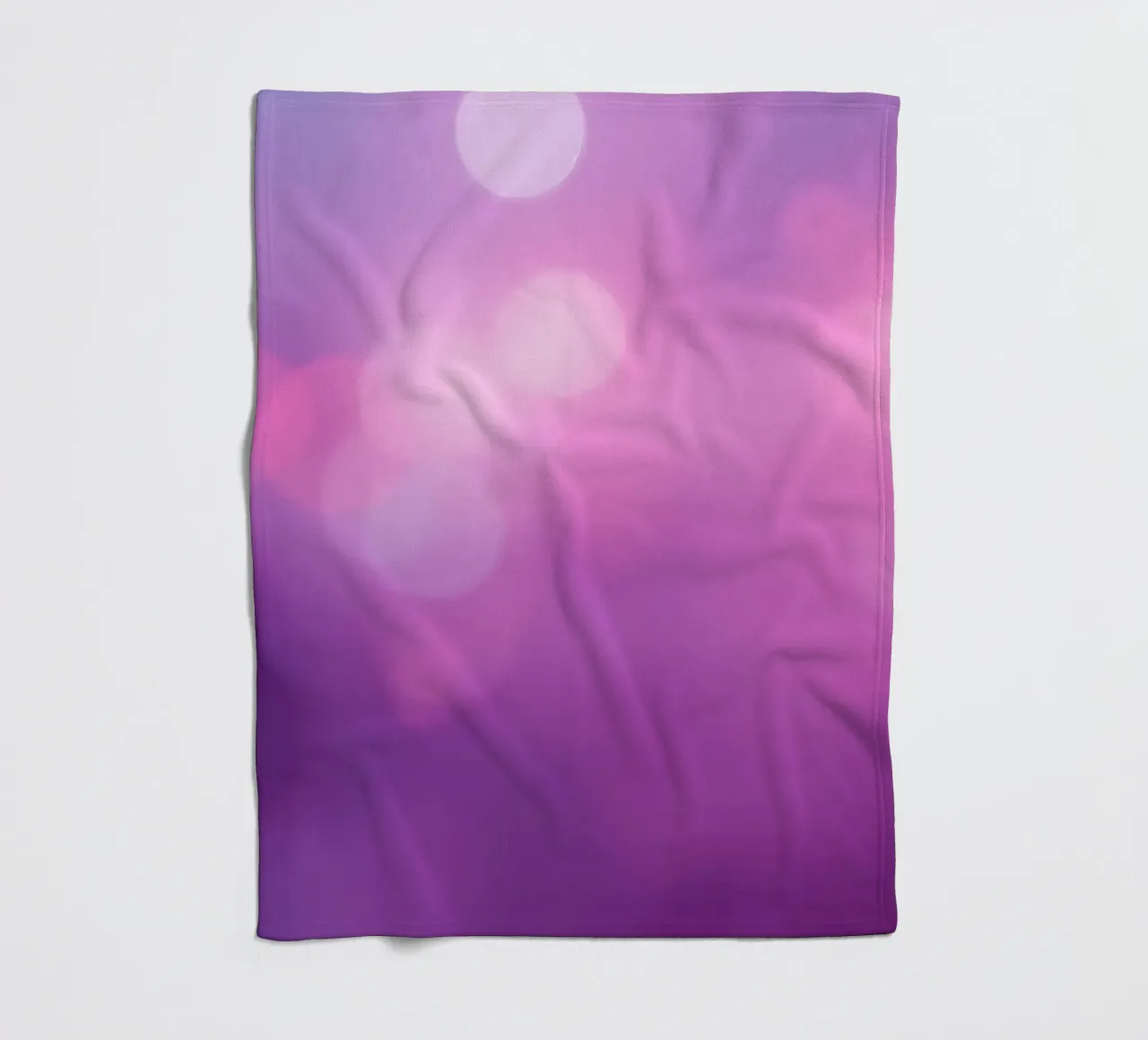 Gli effetti bokeh colorati creano un'atmosfera da sogno ad un livello di coperta in pile da DesignDoodle