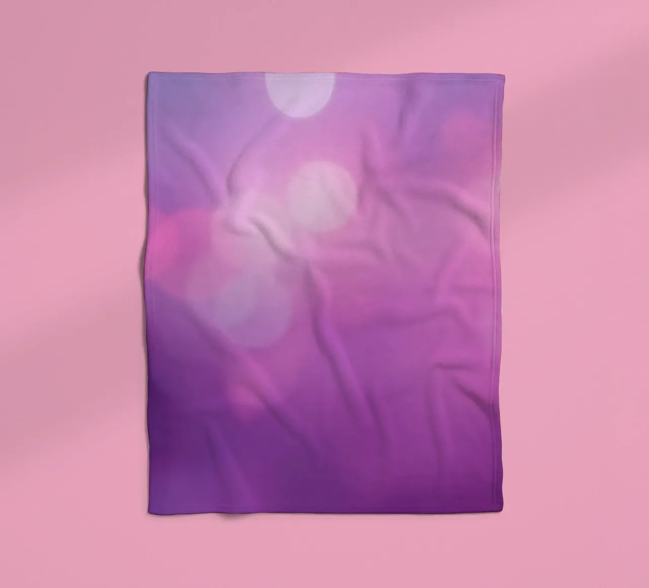 Colorful bokeh effects create a dreamy atmosphere at an even fleece blanket by DesignDoodle