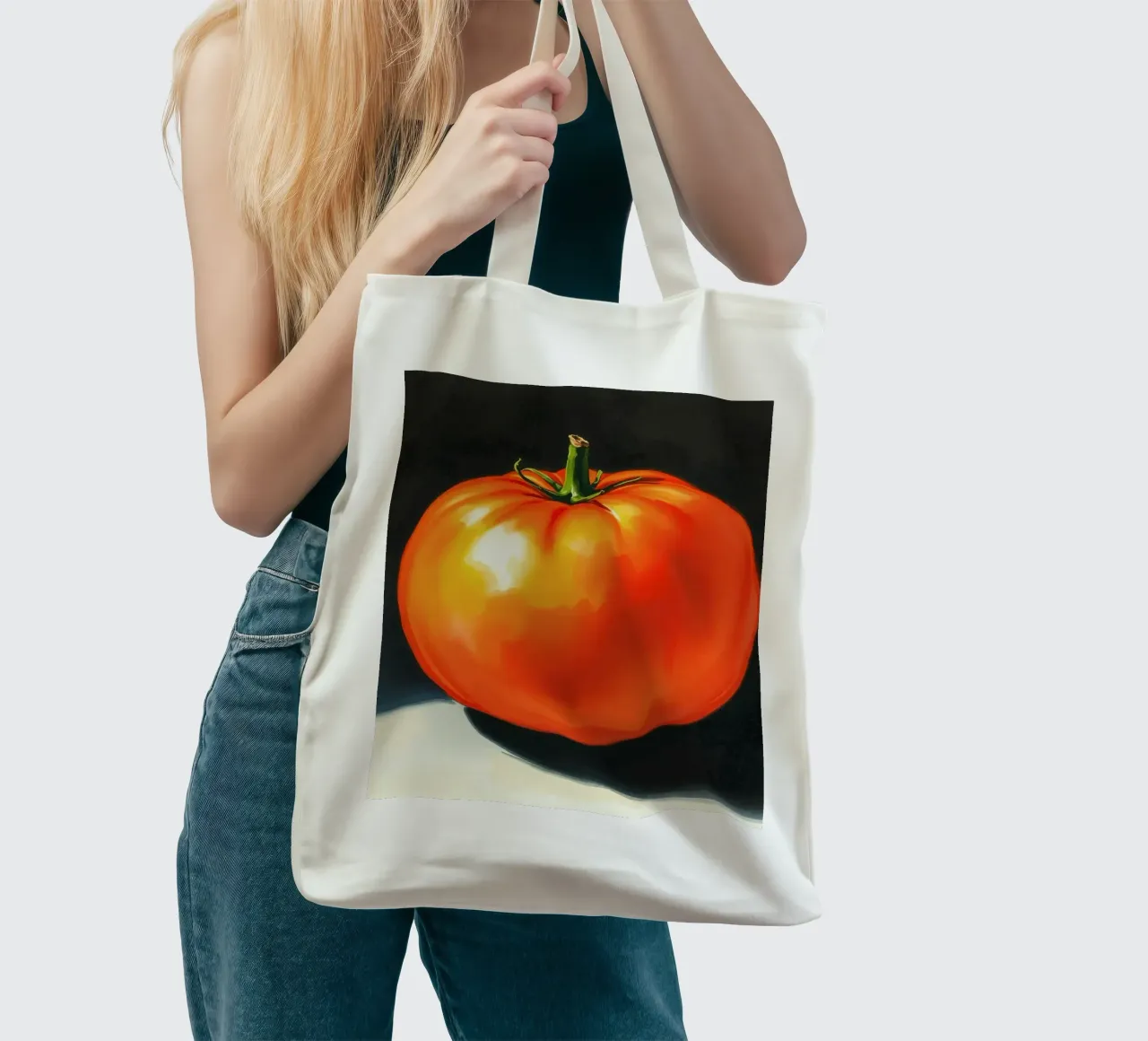 Bright red ripe tomato displayed on a contrasting surface tote bag by DesignDoodle