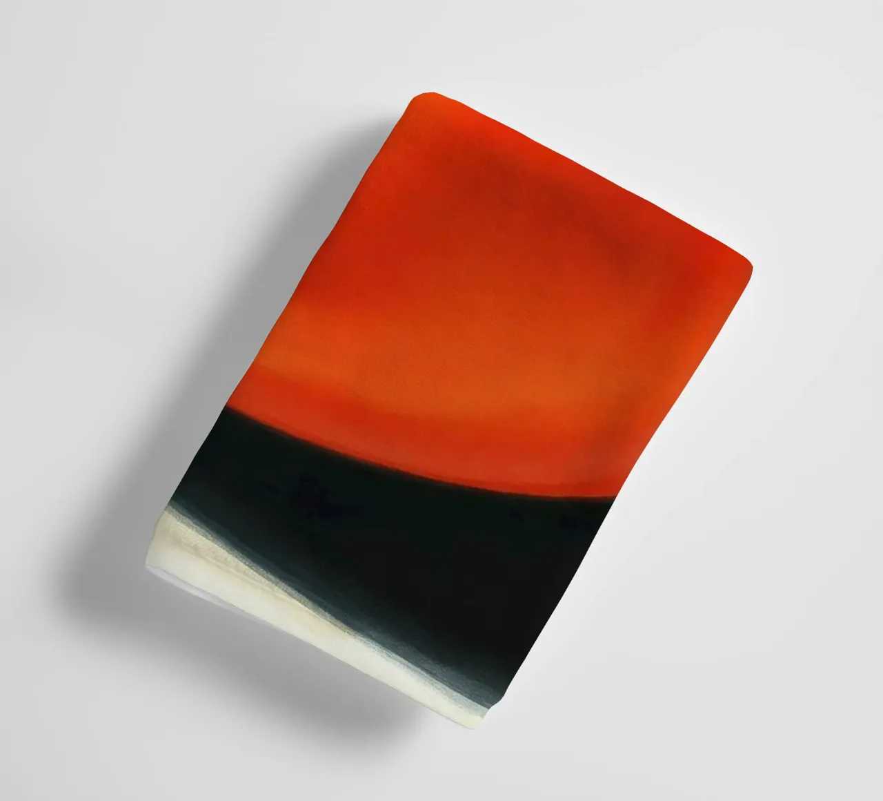 Bright red ripe tomato displayed on a contrasting surface towel by DesignDoodle