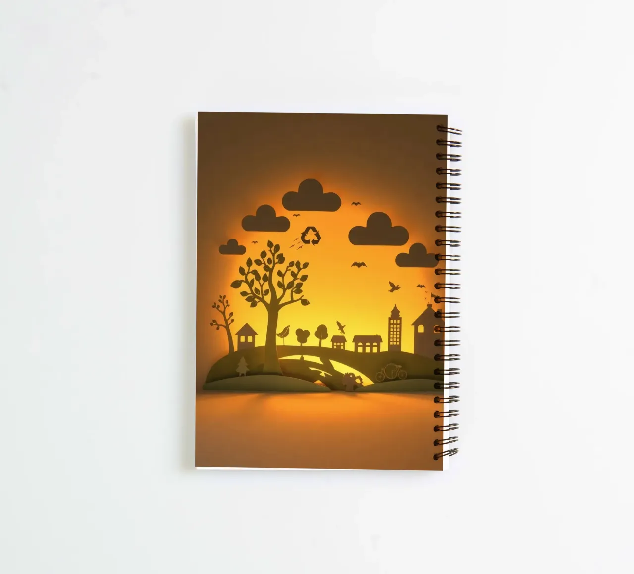 Creative paper art showcases a tranquil countryside scene spiral notebook by DesignDoodle