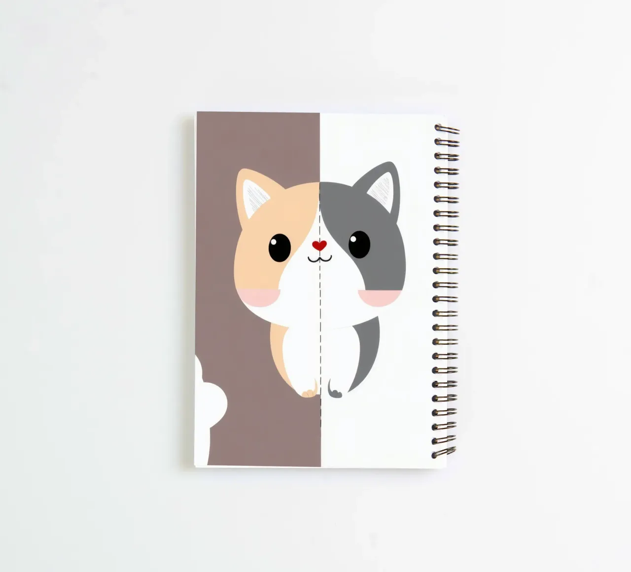 Cute cartoon cat with split color design in a playful style spiral notebook by DesignDoodle