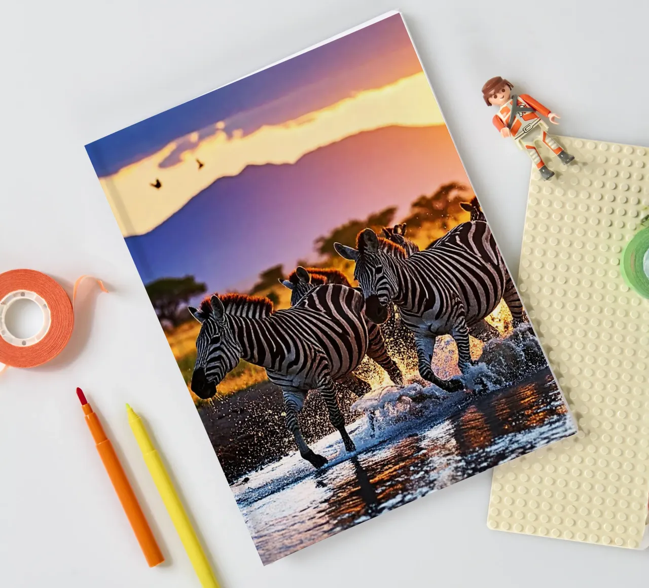 HERD OF ZEBRAS AT SUNSET. notebook by Thierry vobmann photography