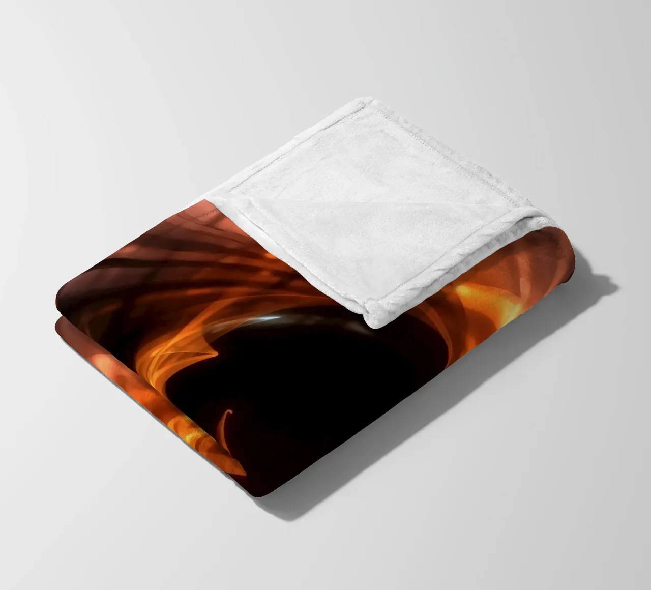 Swirling patterns of orange and black create an abstract art fleece blanket by DesignDoodle