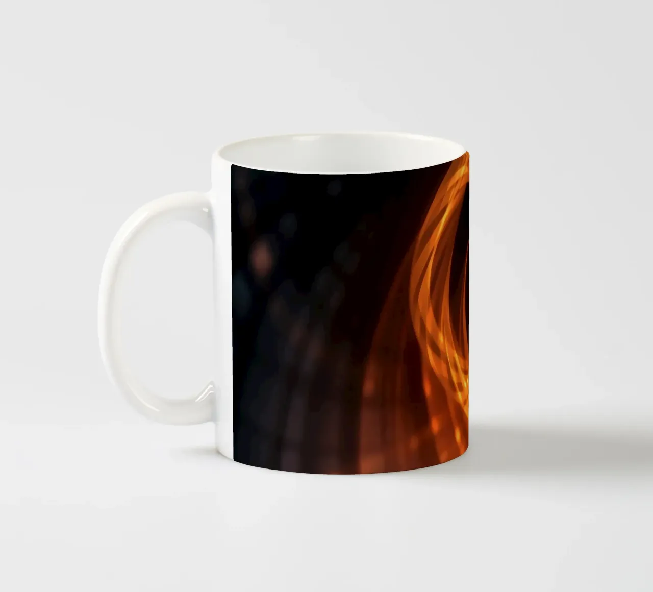 Swirling patterns of orange and black create an abstract art ceramic mug by DesignDoodle