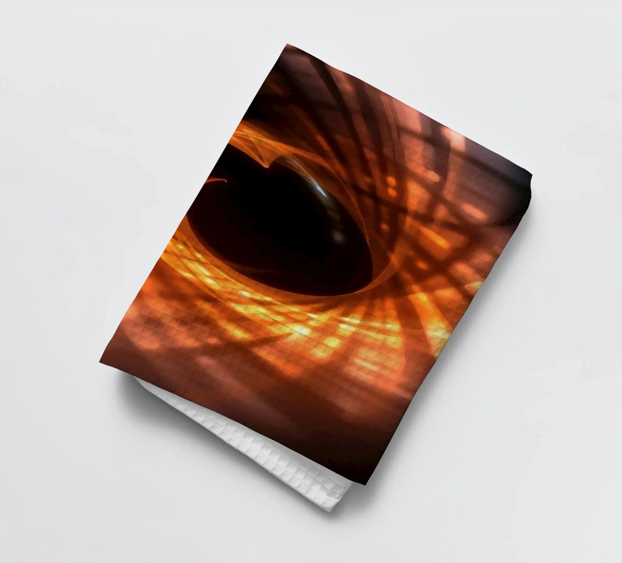 Swirling patterns of orange and black create an abstract art tea towel by DesignDoodle