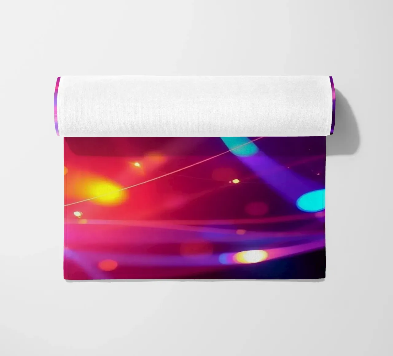 abstract light trails create an energetic atmosphere beach towel by DesignDoodle