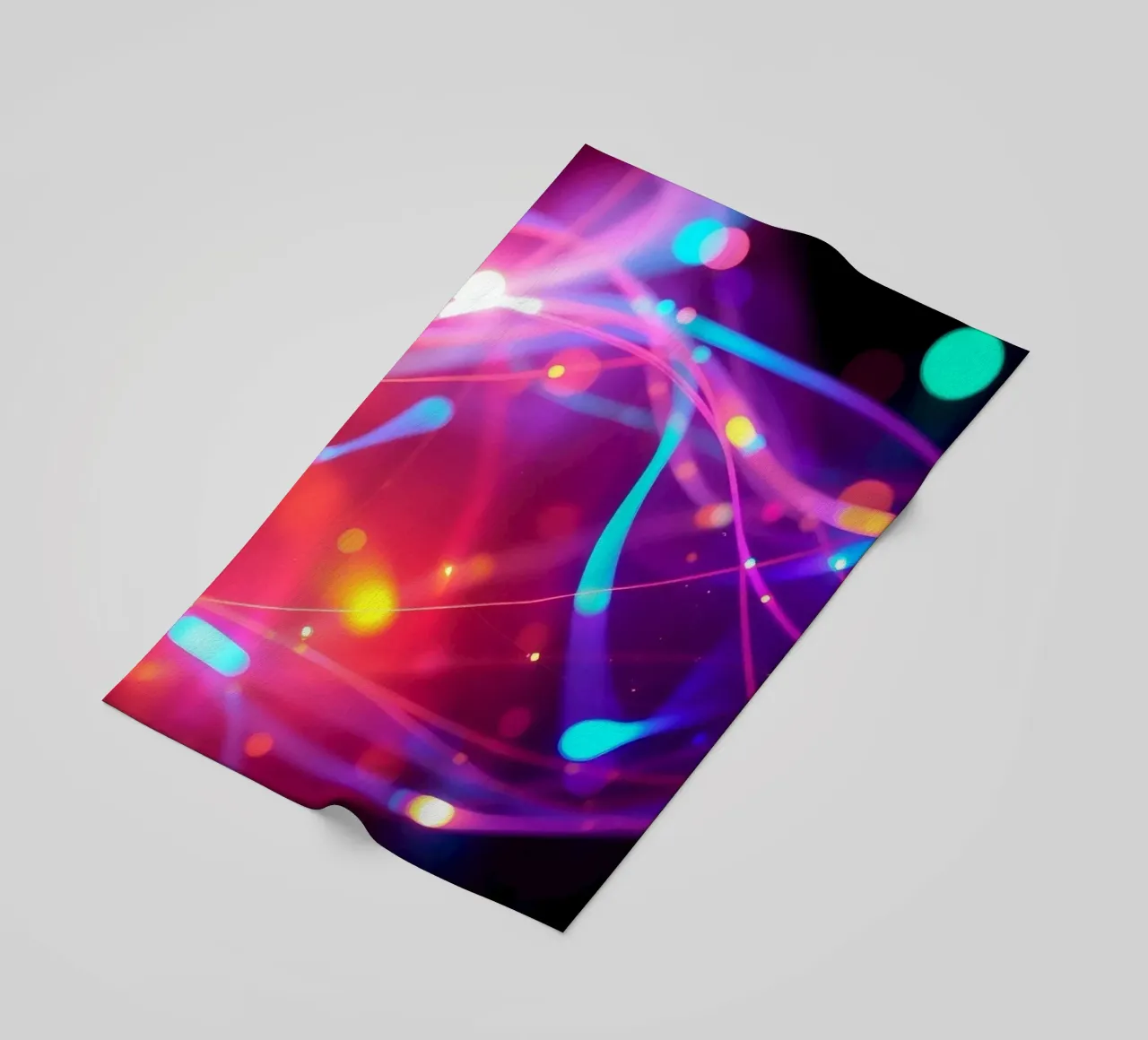 abstract light trails create an energetic atmosphere beach towel by DesignDoodle