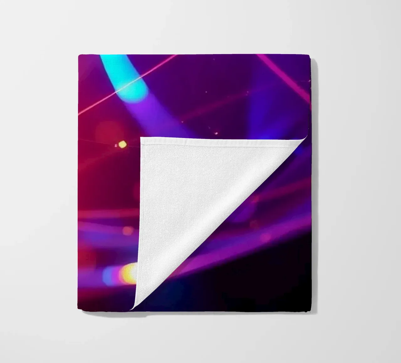 abstract light trails create an energetic atmosphere beach towel by DesignDoodle