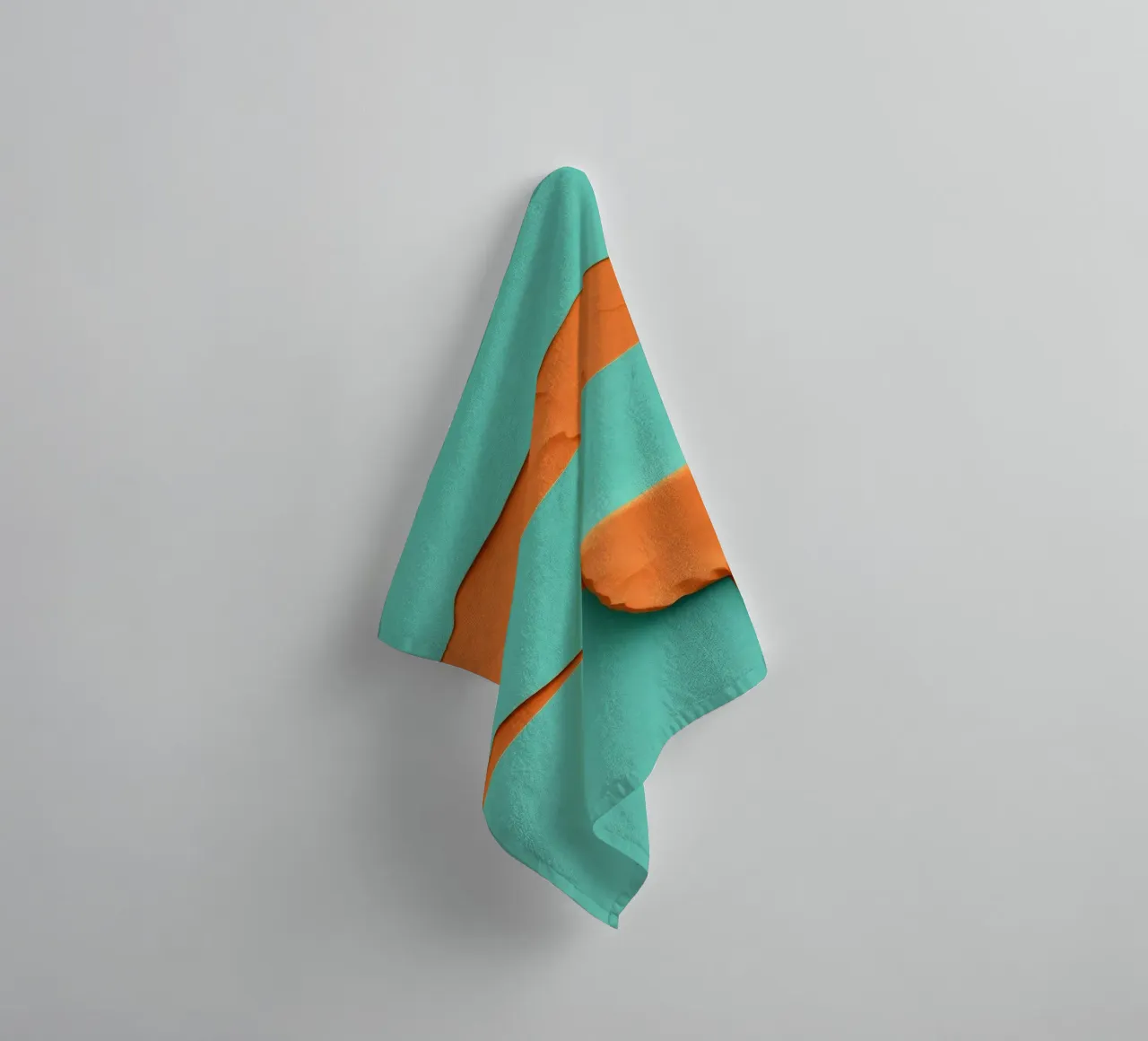 paper layers create an abstract landscape in vibrant orange towel by DesignDoodle