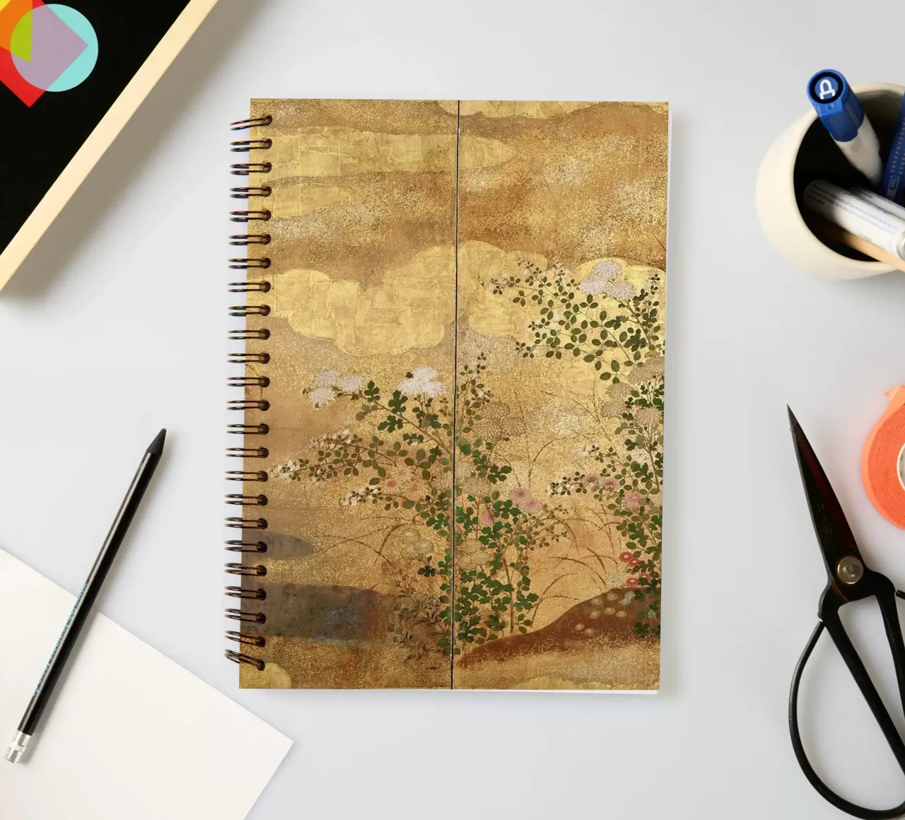 Autumn Flowers and Grasses Beside a Stream, Against Clouds. spiral notebook by ARTOTHEK