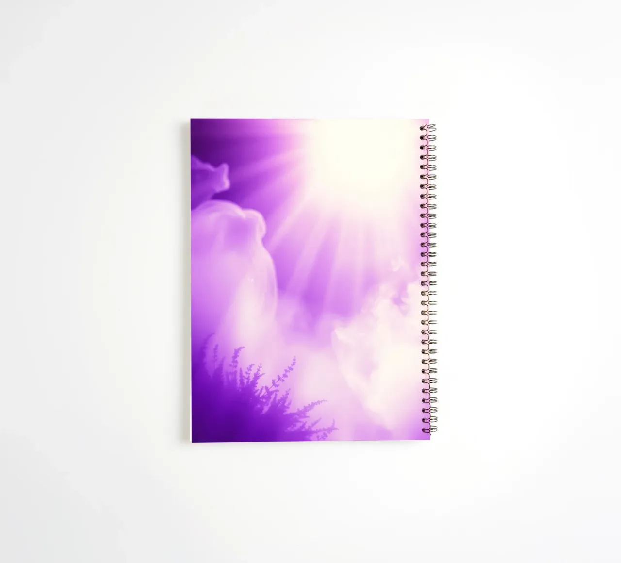 Purple light beams scatter through misty clouds spiral notebook by DesignDoodle