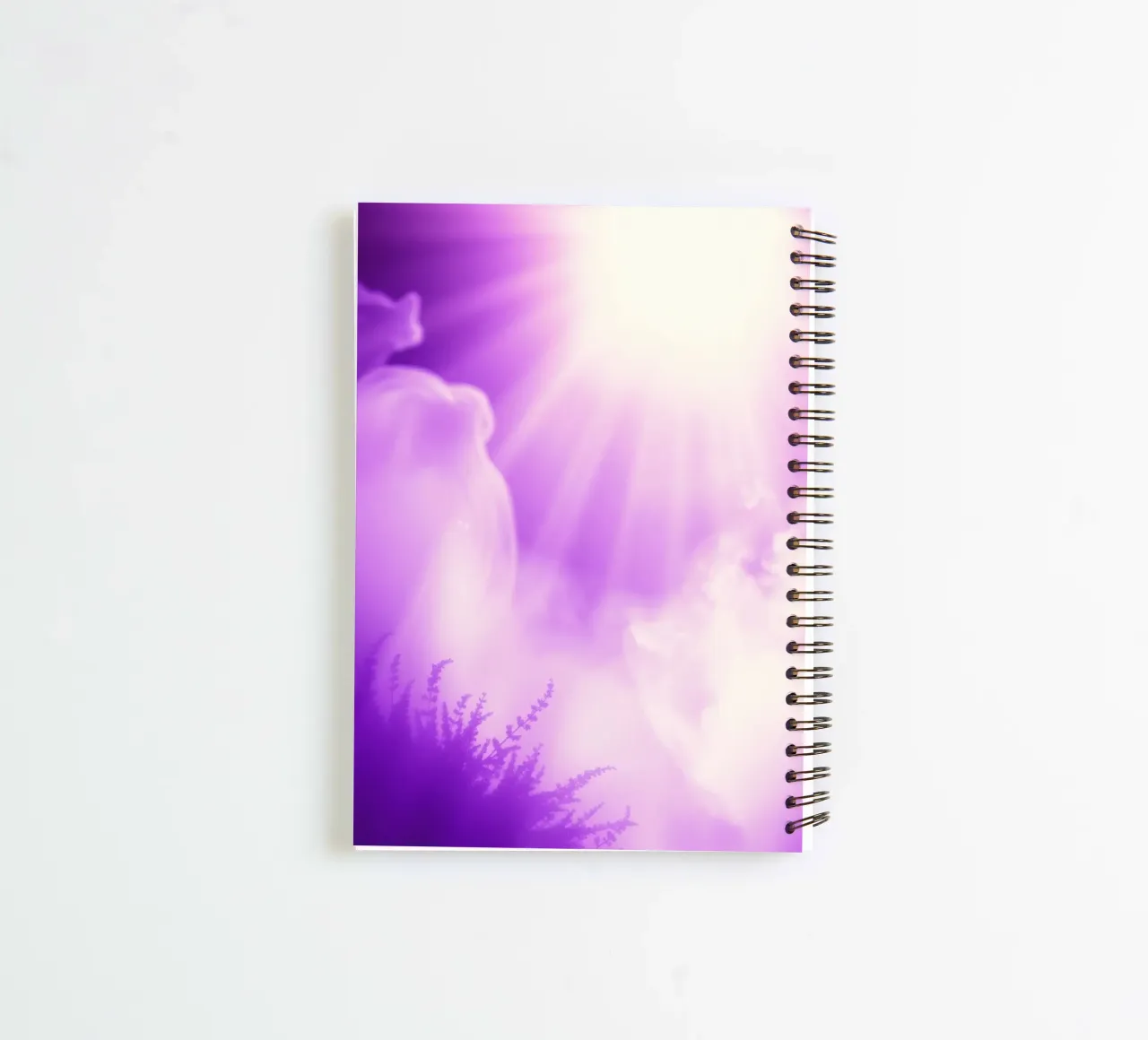 Purple light beams scatter through misty clouds spiral notebook by DesignDoodle