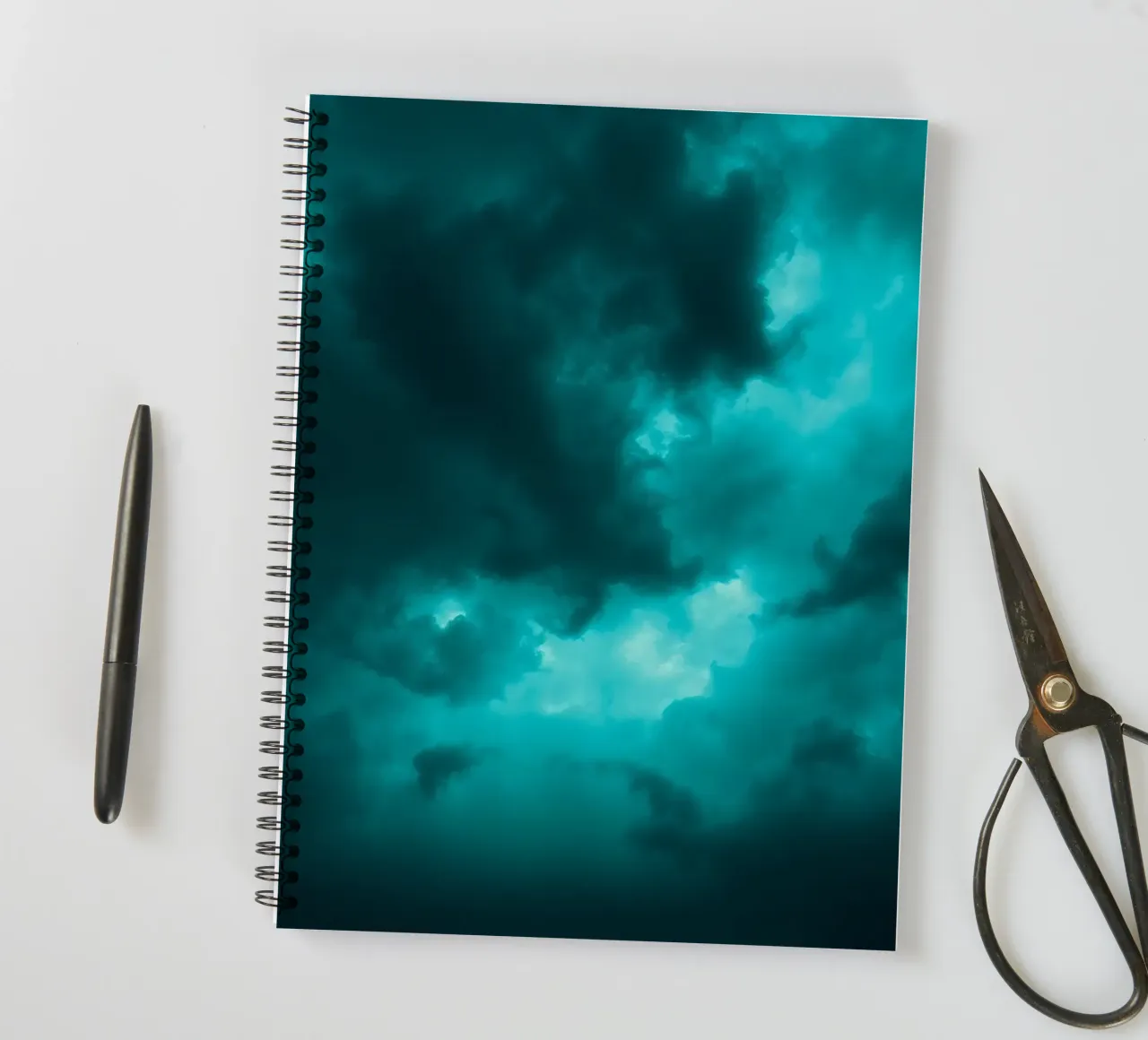 Dramatic clouds swirl in a moody sky just before the storm spiral notebook by DesignDoodle
