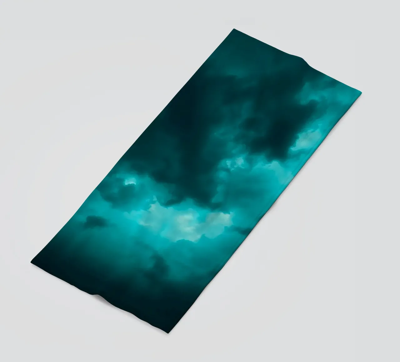 Dramatic clouds swirl in a moody sky just before the storm beach towel by DesignDoodle