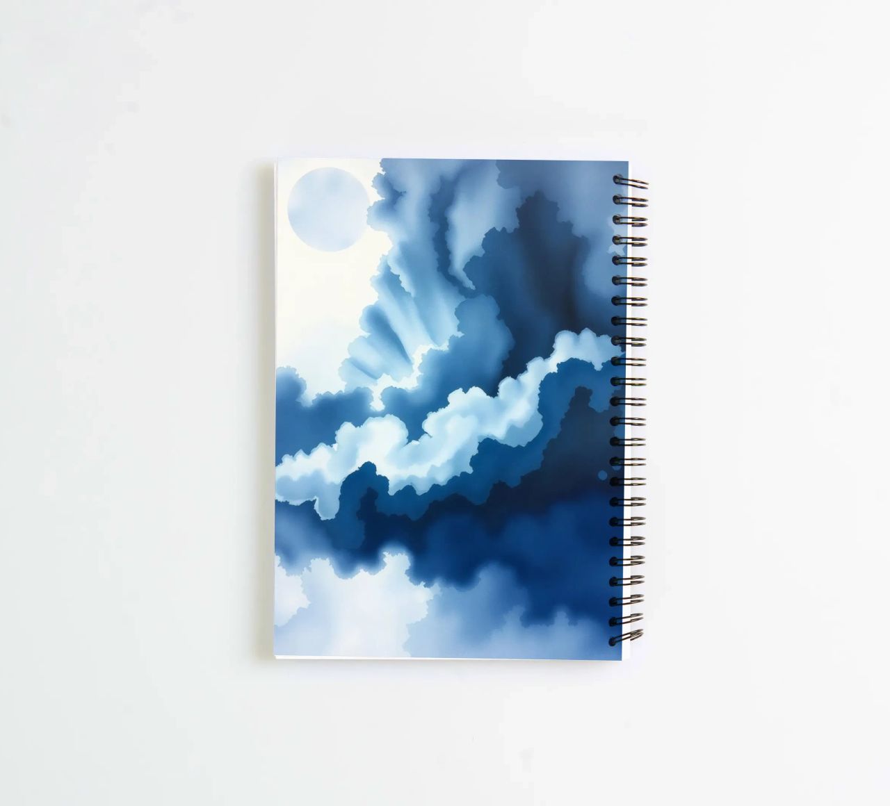 Bright clouds reflect light in a calm bluish atmosphere spiral notebook by DesignDoodle