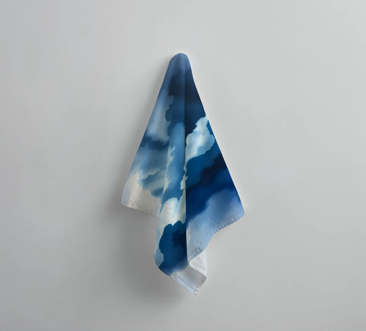 Bright clouds reflect light in a calm bluish atmosphere towel by DesignDoodle