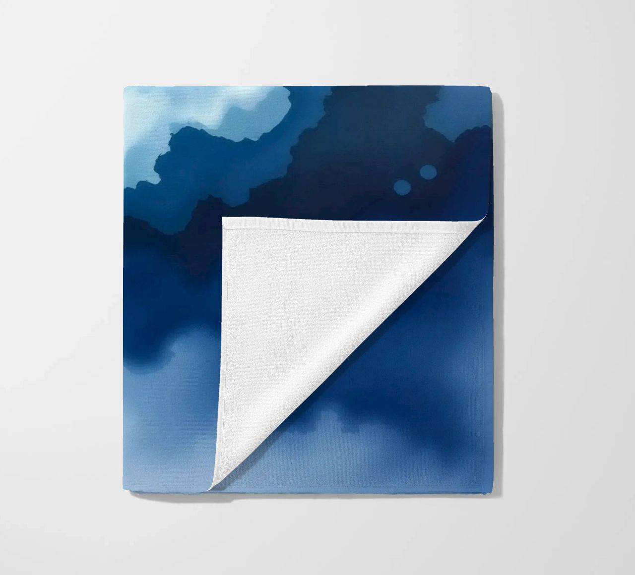 Bright clouds reflect light in a calm bluish atmosphere beach towel by DesignDoodle
