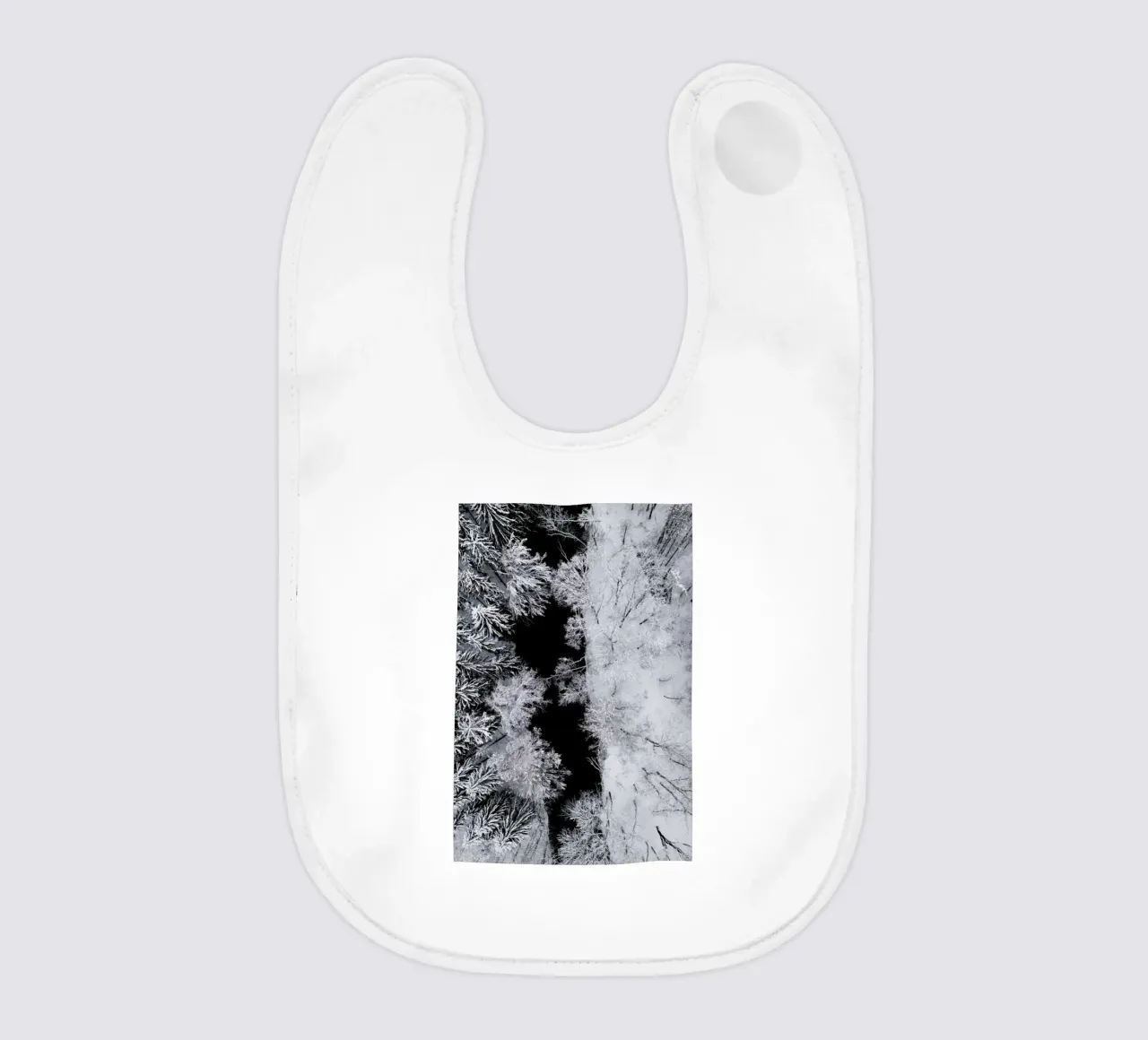 Black River Through The Snowy Winter Forest baby bib by Studio Nahili