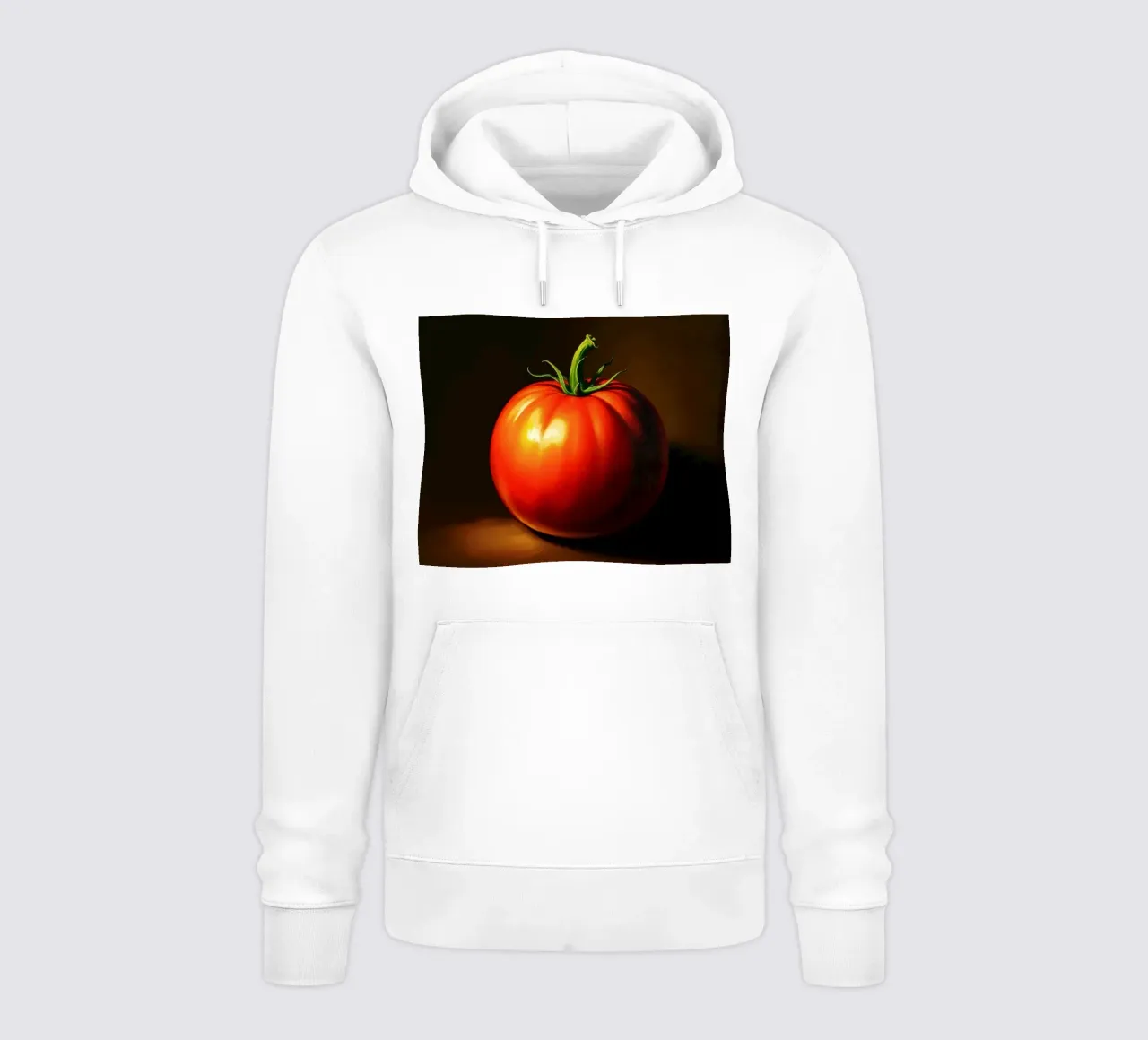 pomodoro rosso appoggiato su una superficie scura con illuminazione soffusa felpa con cappuccio da DesignDoodle
