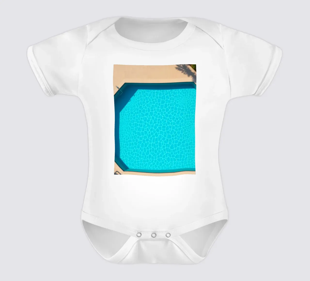 Bright blue swimming pool surrounded by a sunny patio short-sleeve baby romper by DesignDoodle
