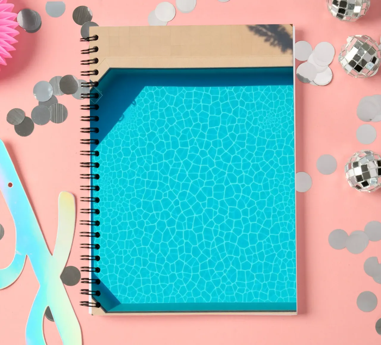 Bright blue swimming pool surrounded by a sunny patio spiral notebook by DesignDoodle