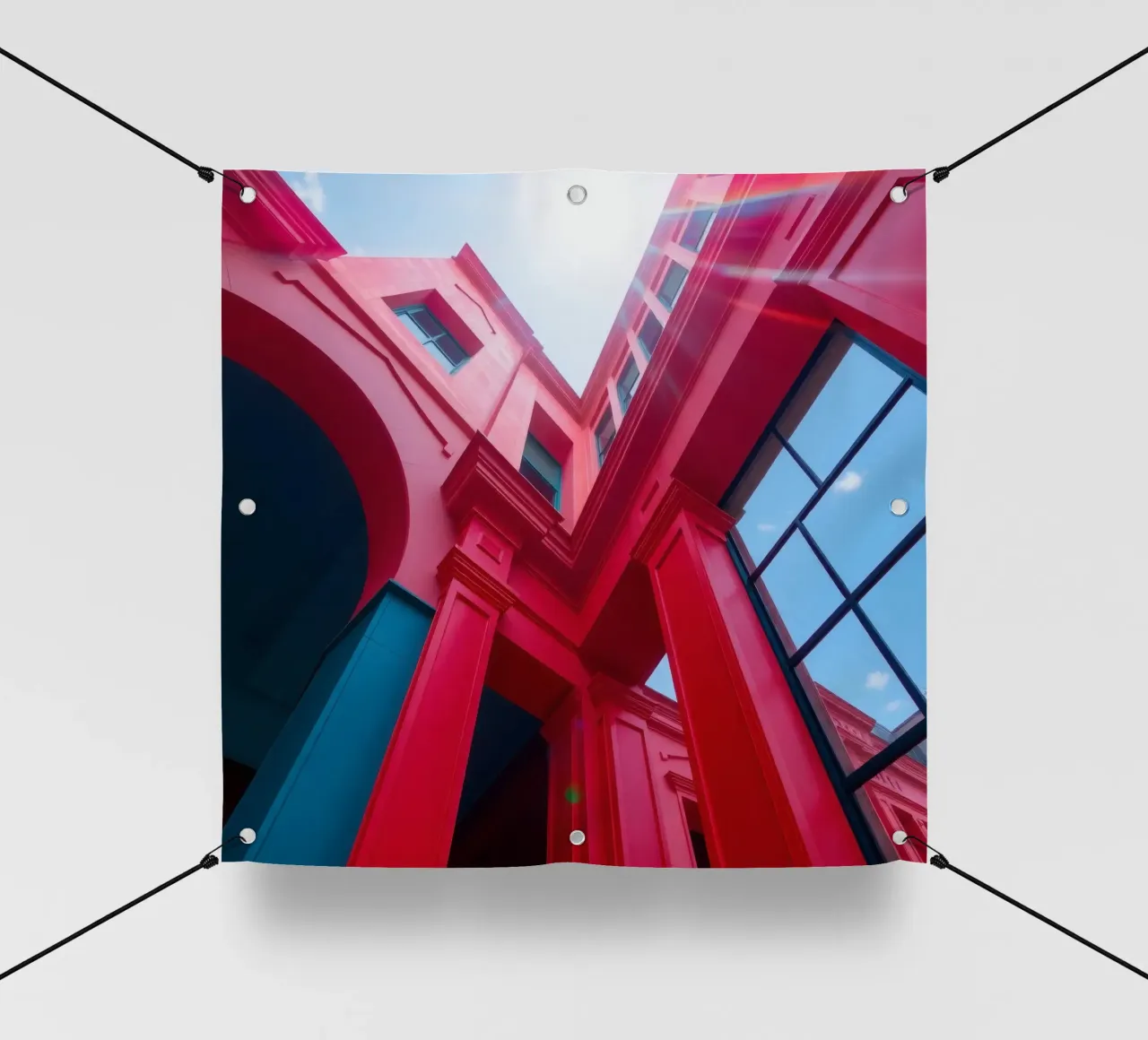dettaglio architettonico di un edificio rosso sotto un cielo sereno telo in pvc da DesignDoodle