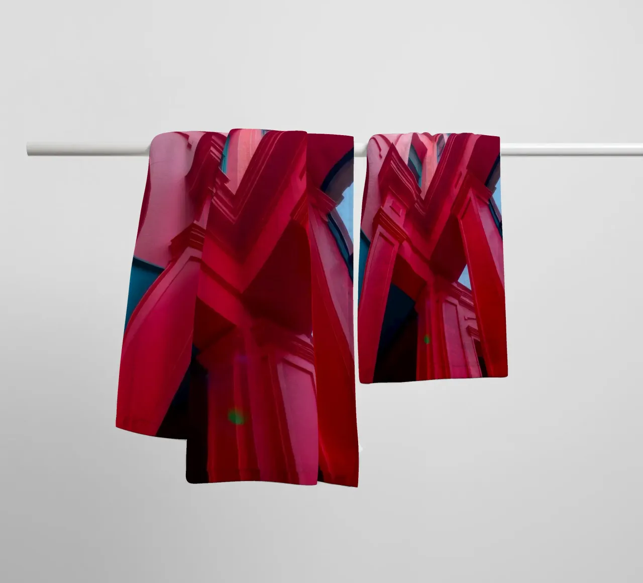 architectural detail of a red building under a clear sky towel by DesignDoodle