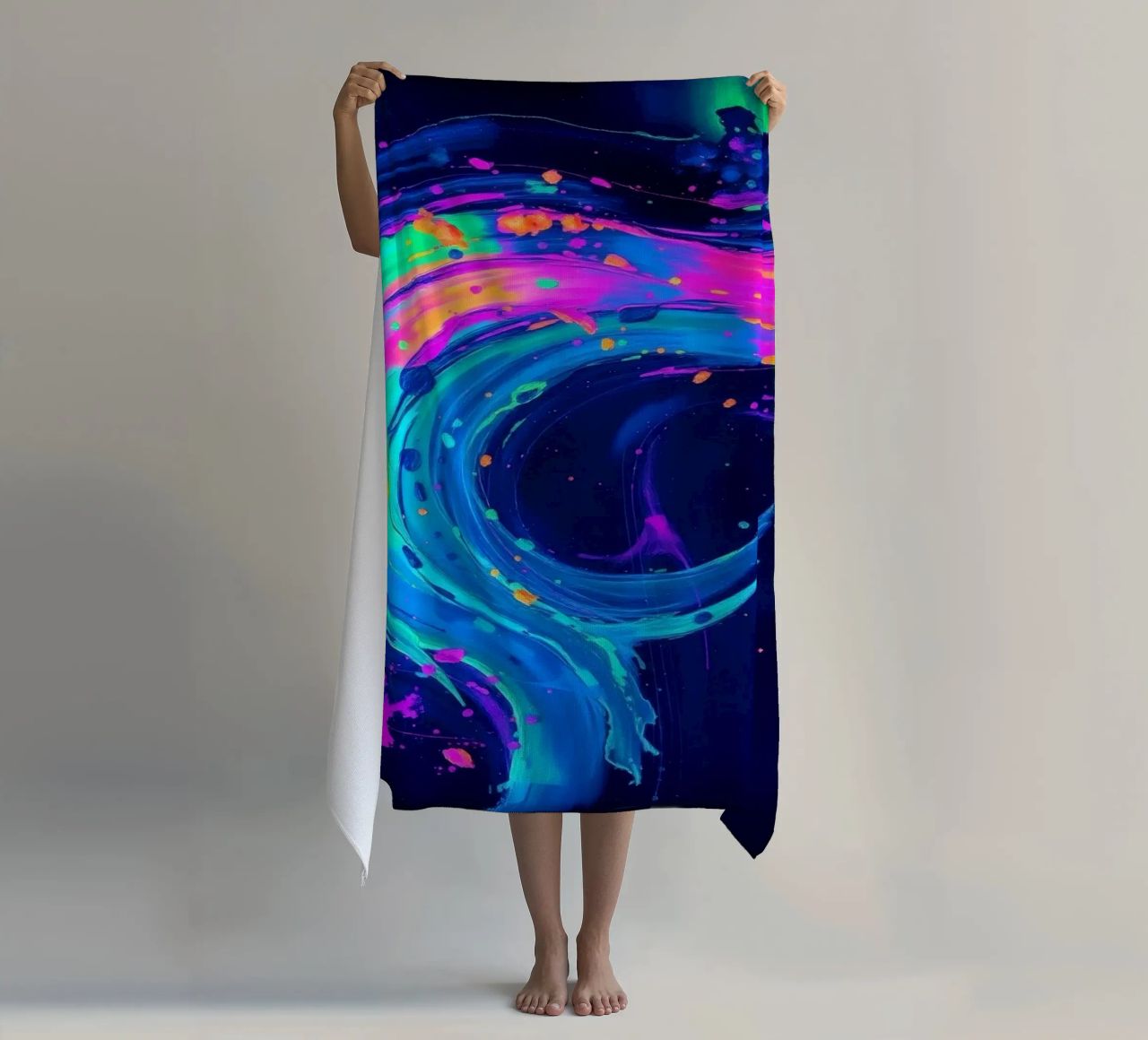 abstract swirl with neon hues creating motion in a dark back beach towel by DesignDoodle