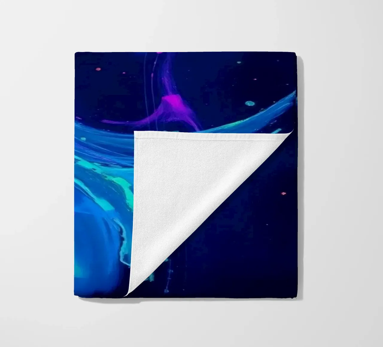 abstract swirl with neon hues creating motion in a dark back beach towel by DesignDoodle