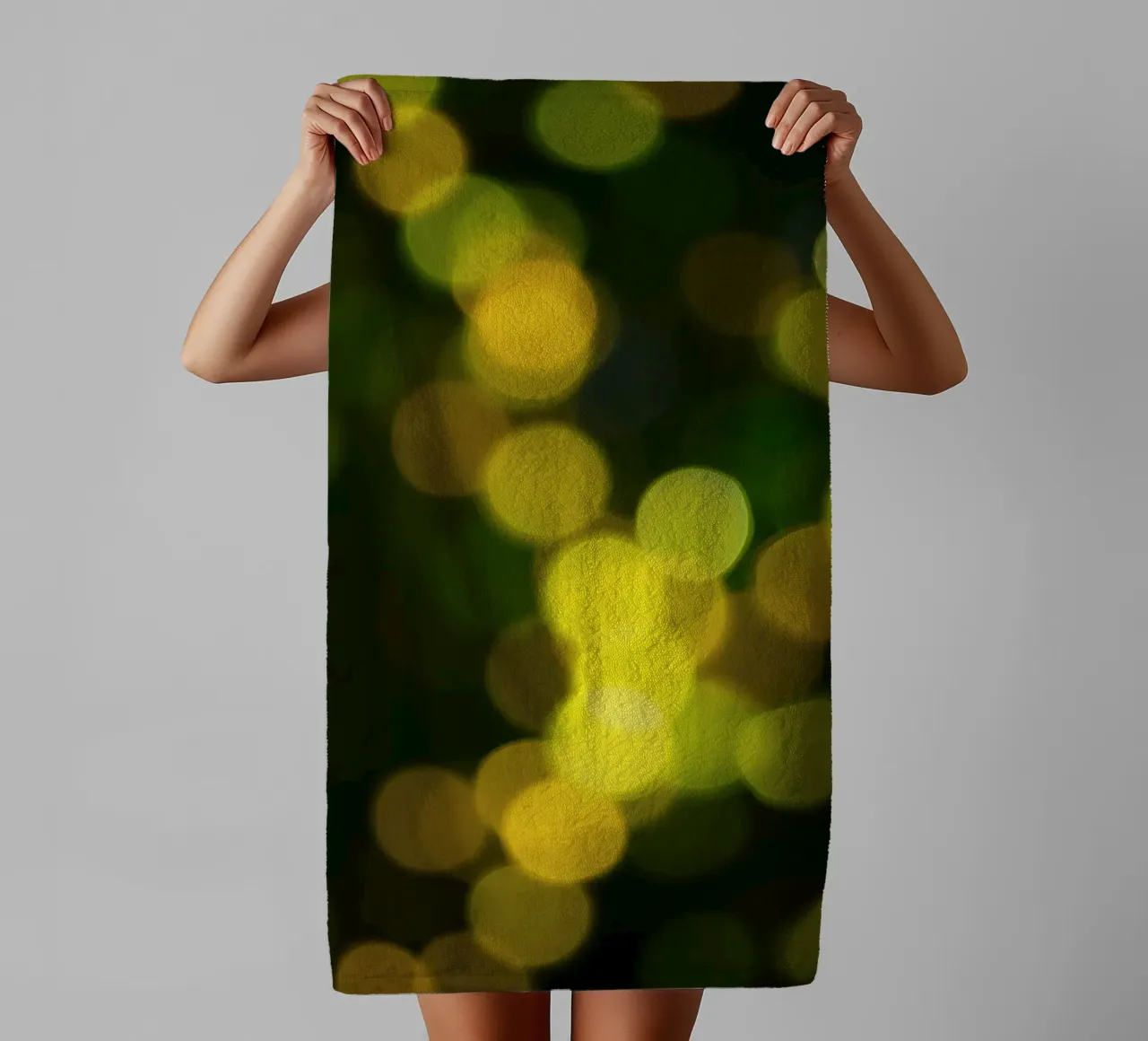bokeh lights create a festive atmosphere towel by DesignDoodle