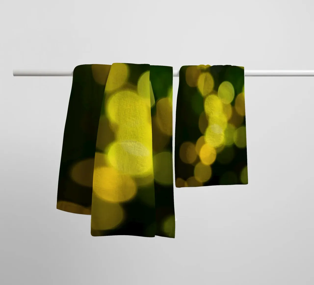 bokeh lights create a festive atmosphere towel by DesignDoodle