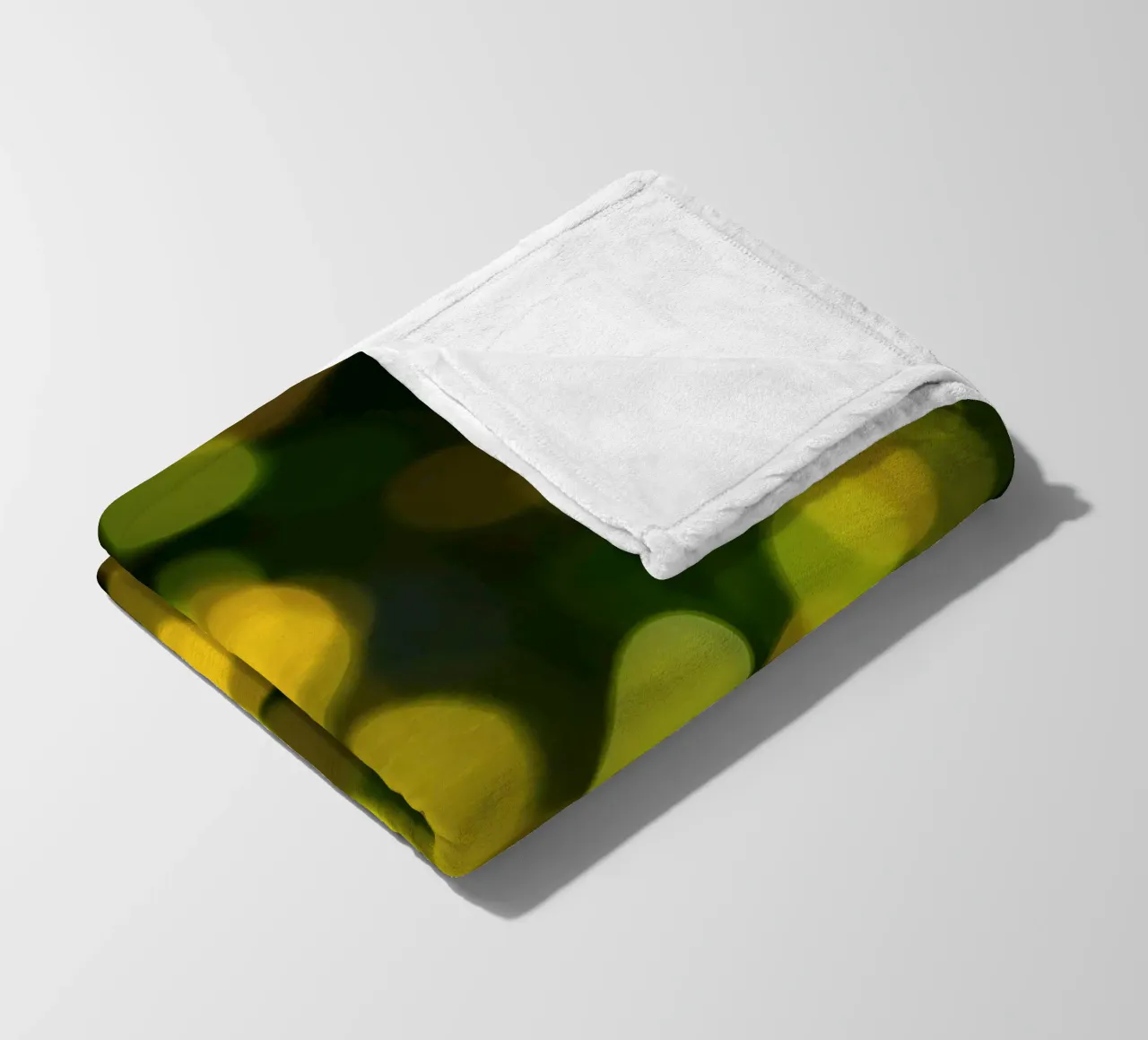 bokeh lights create a festive atmosphere fleece blanket by DesignDoodle