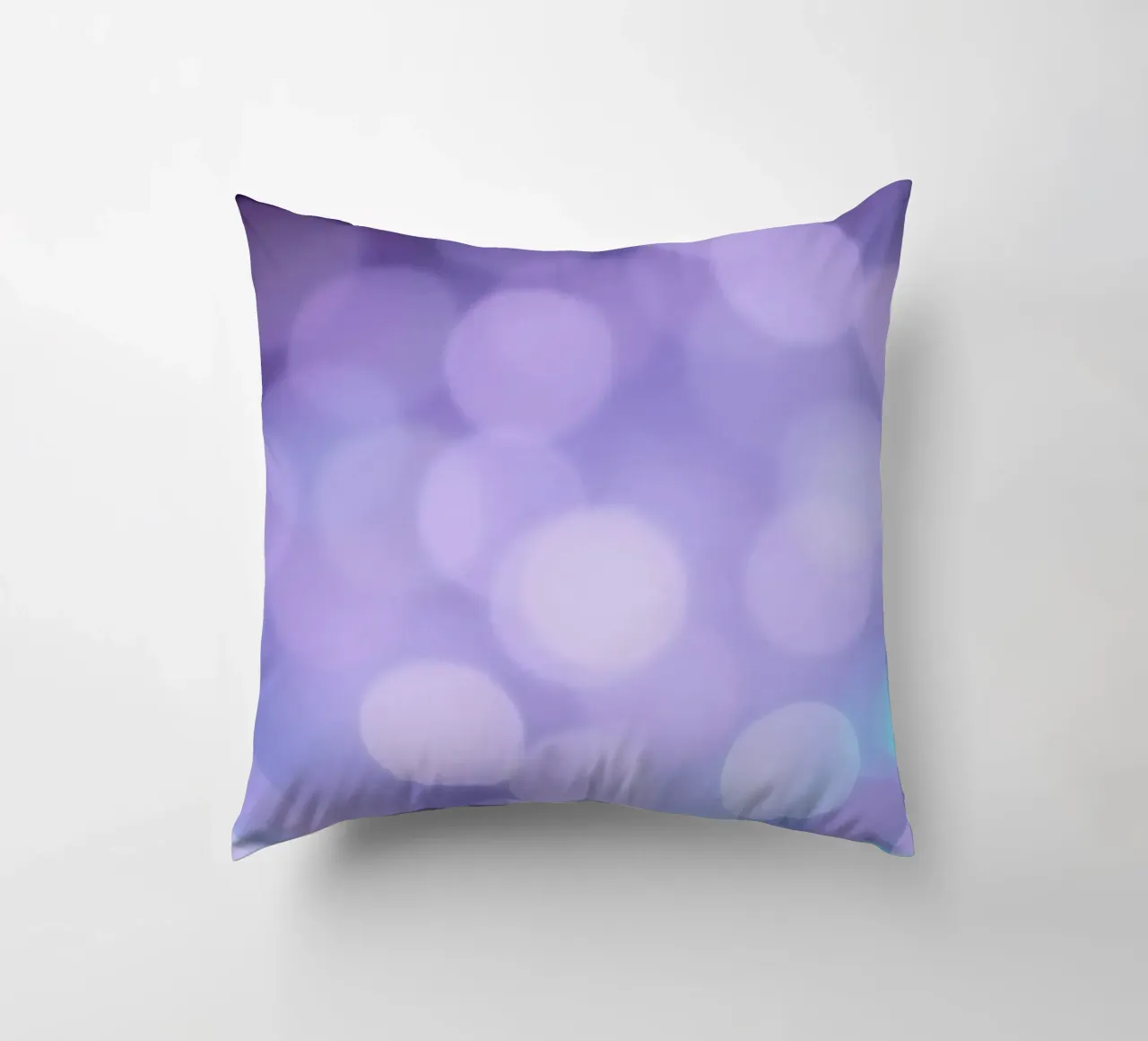 Sfondo bokeh con luci soffuse viola e blu cuscino da DesignDoodle