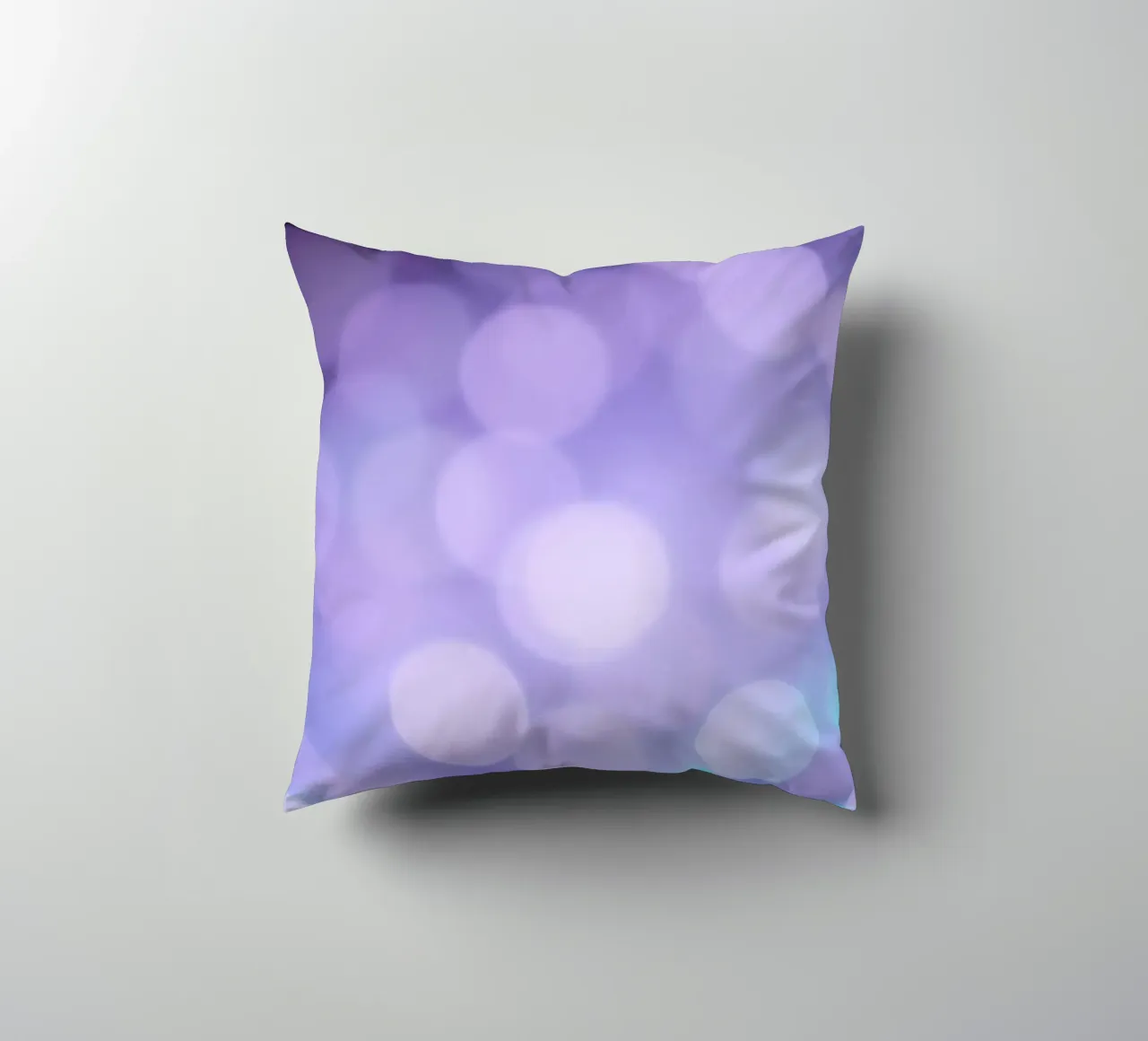 Sfondo bokeh con luci soffuse viola e blu cuscino da DesignDoodle