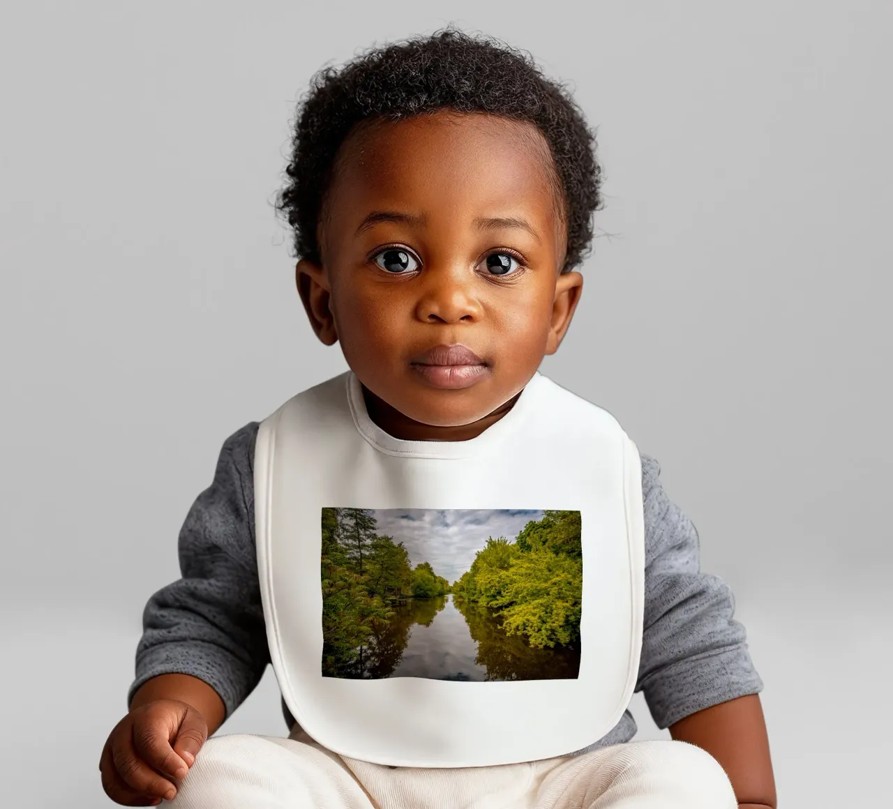 View of the river Saale with reflections of the trees on the bank baby bib by Marcus Beckert | Fotografie