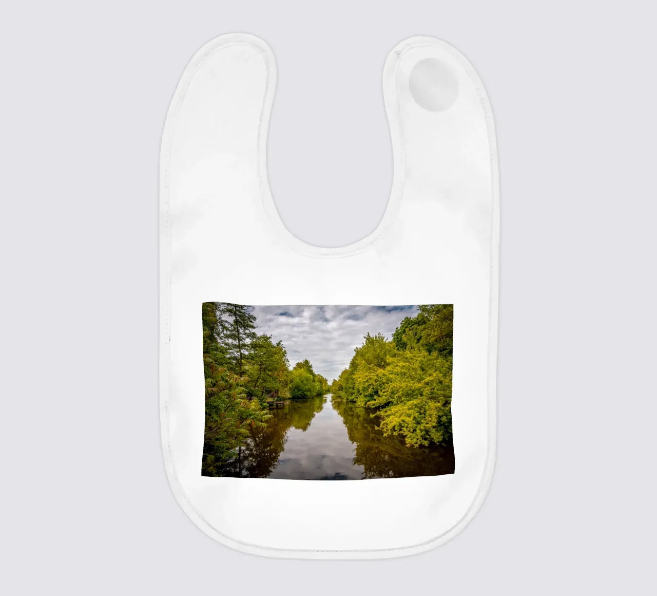 View of the river Saale with reflections of the trees on the bank baby bib by Marcus Beckert | Fotografie