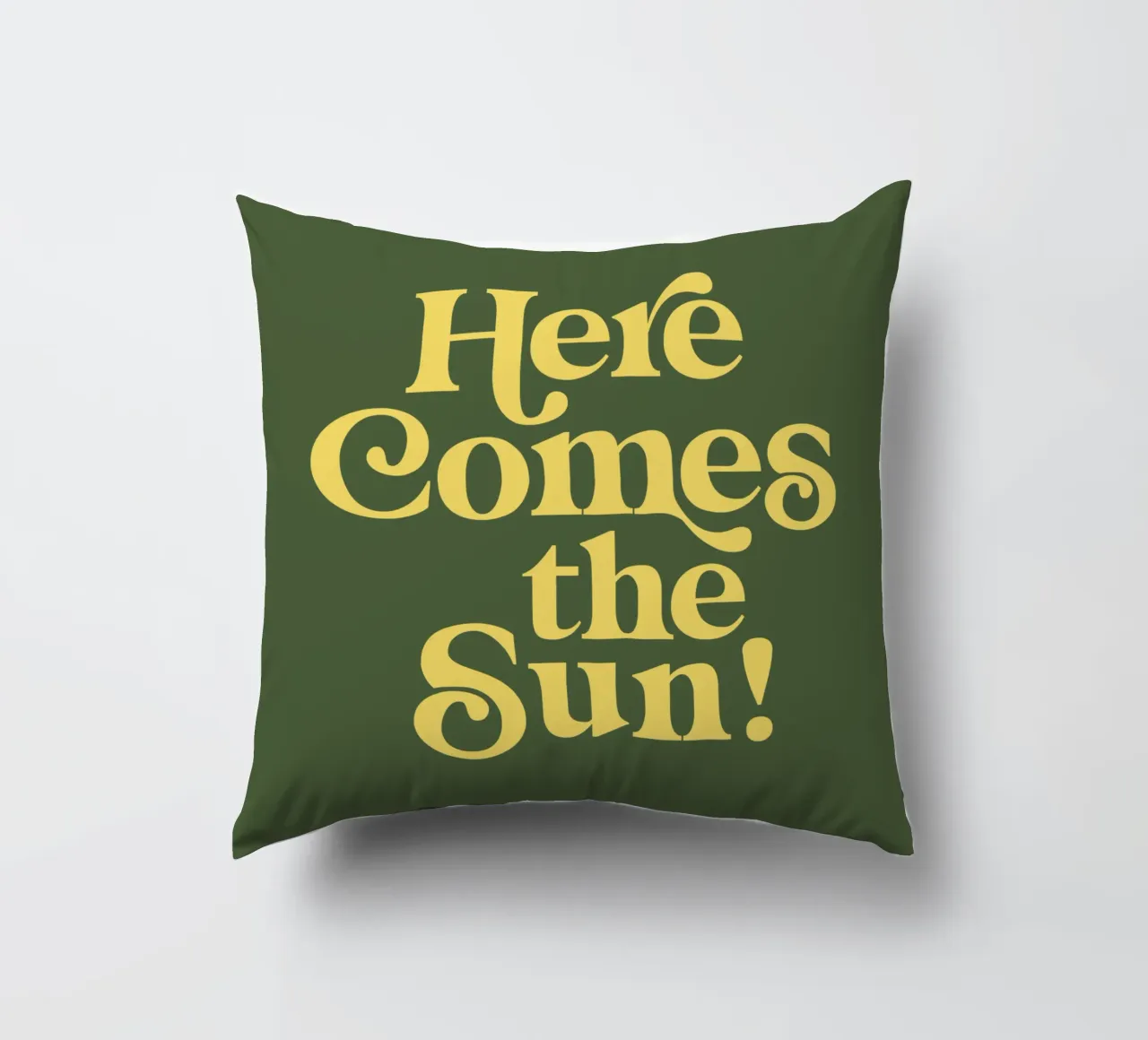 Here Comes the Sun Typography Print in Green and Yellow decorative cushion by THE MOTIVATED TYPE