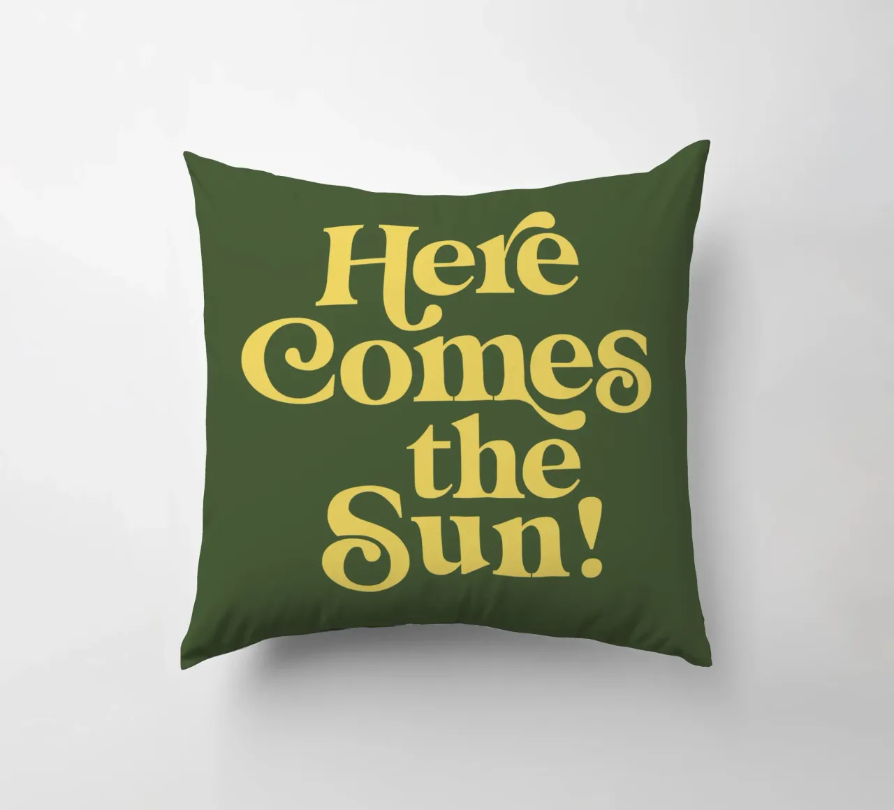 Here Comes the Sun Typography Print in Green and Yellow decorative cushion by THE MOTIVATED TYPE