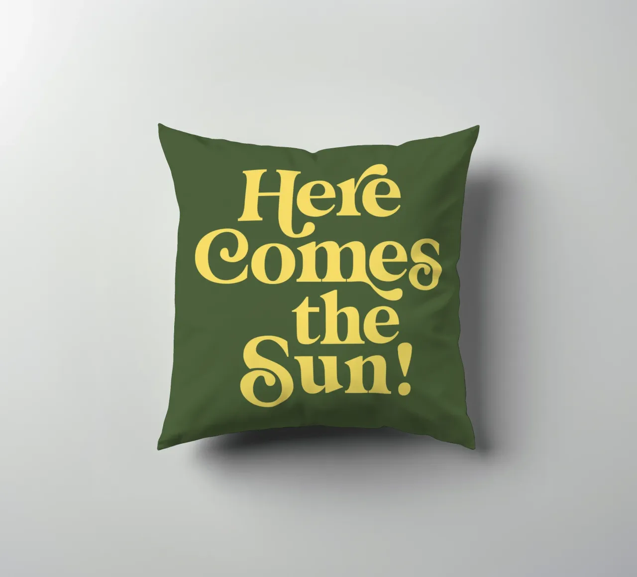 Here Comes the Sun Typography Print in Green and Yellow decorative cushion by THE MOTIVATED TYPE